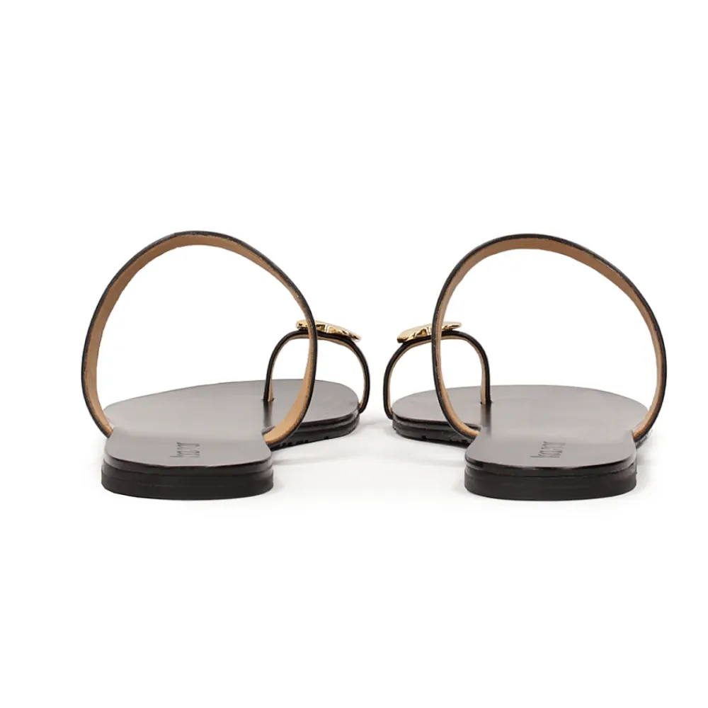 Kazar Sandaler*Minimalistiske e mules på en flad sål Sort